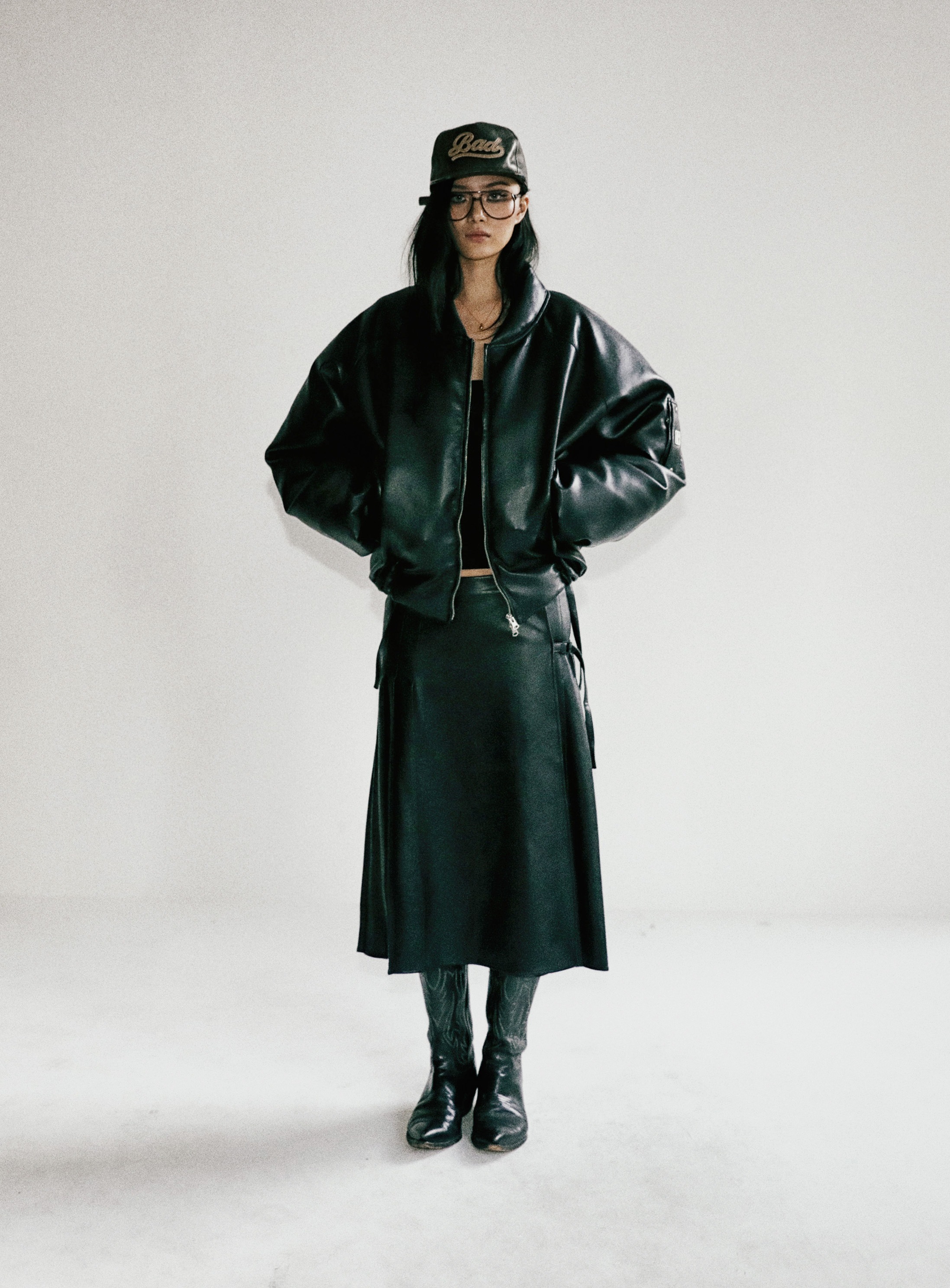 BADBLOOD】 PLEATED LEATHER WRAP SKIRT : BLACK