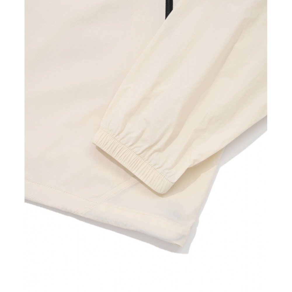 COVERNAT 軽量パッカブルウィンドブレーカーエクリュ COVERNAT 軽量パッカブルウィンドブレーカーエクリュ