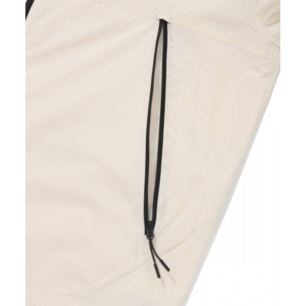 COVERNAT 軽量パッカブルウィンドブレーカーエクリュ COVERNAT 軽量パッカブルウィンドブレーカーエクリュ