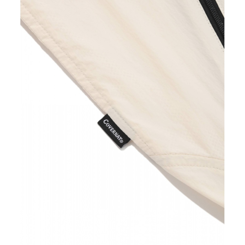 COVERNAT 軽量パッカブルウィンドブレーカーエクリュ COVERNAT 軽量パッカブルウィンドブレーカーエクリュ