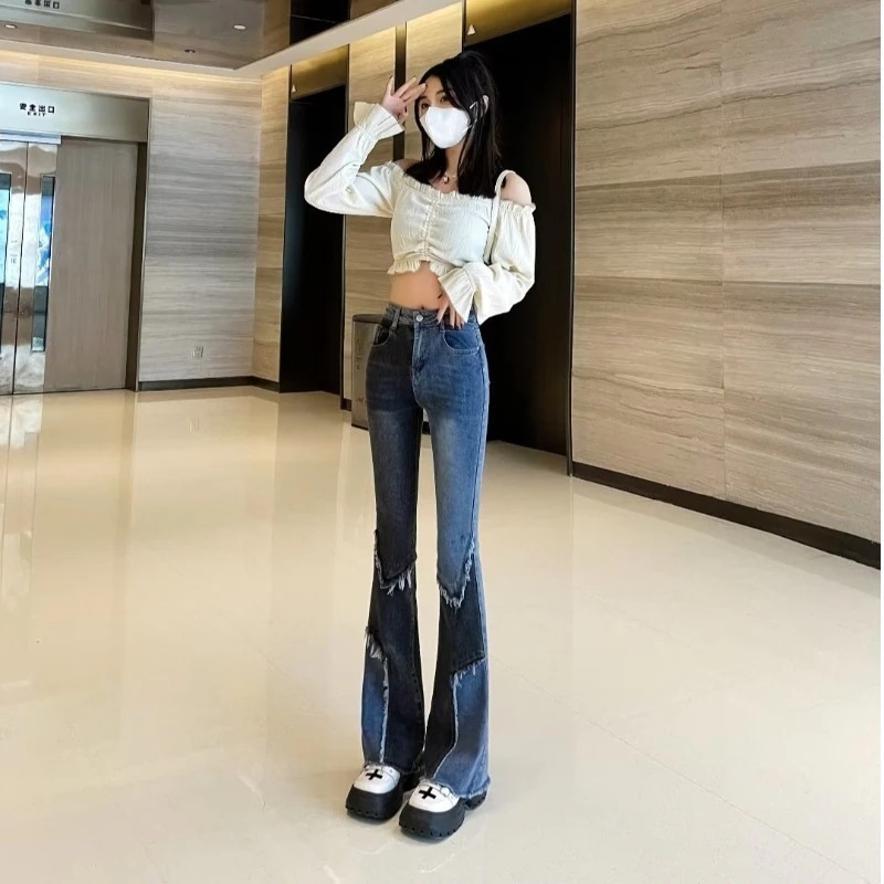ジーンズは流行スキニーパンツ女性の新しい気質の濃いストレートパンツ春秋パンツ