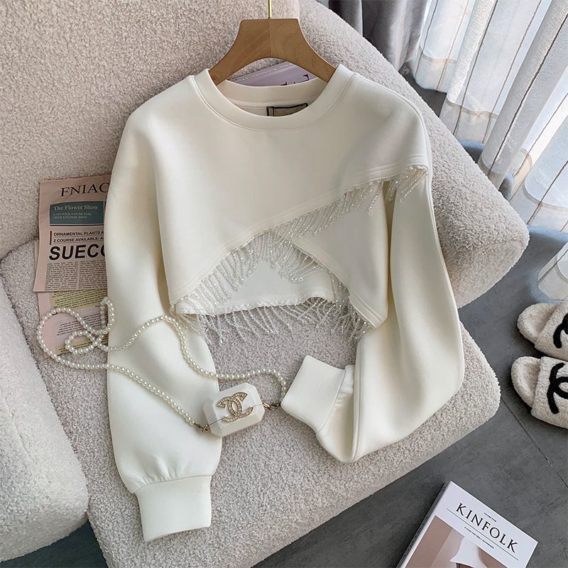 ハイエンドのカスタマイズ-ファッショナブルなスウェットシャツスカートスーツ 2024 春の新作ゼブラ柄甘辛ヒップドレスタッセル長袖トップトレンディ