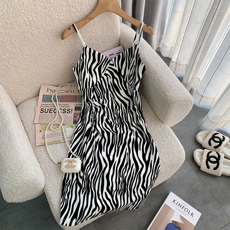 ハイエンドのカスタマイズ-ファッショナブルなスウェットシャツスカートスーツ 2024 春の新作ゼブラ柄甘辛ヒップドレスタッセル長袖トップトレンディ