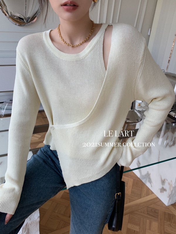 早春秋の新しい韓国版のニットだぶだぶでやせているデザインが不規則で肩の露出したセーターの女性 好評受付中