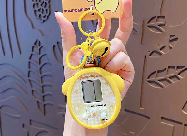 Qoo10] サンリオ たまごっち ユニ カバー キャラクターゲ