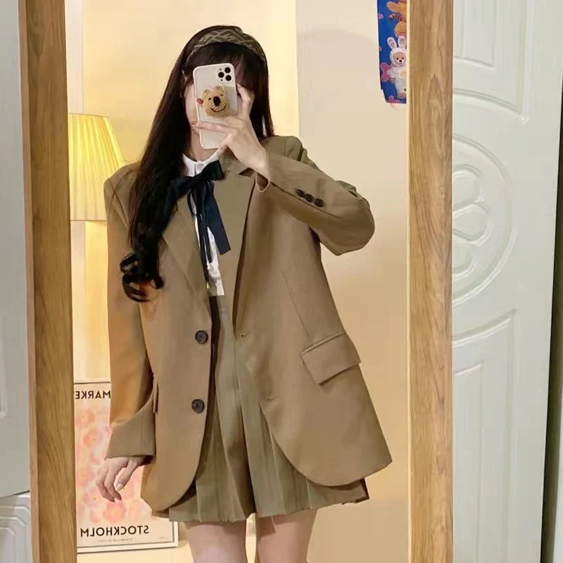 英倫学院のスーツの女性秋の新型の半袖のシャツの復古のゆったりしたスーツのコートのひだの半身の