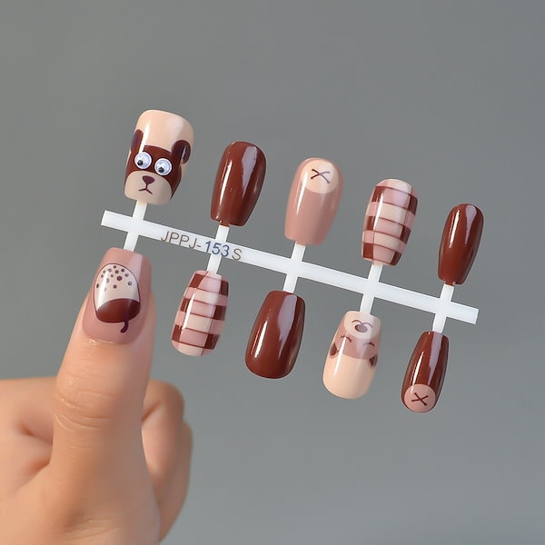 Qoo10] 【速達!】目を動かすクマのネイルネイルネ