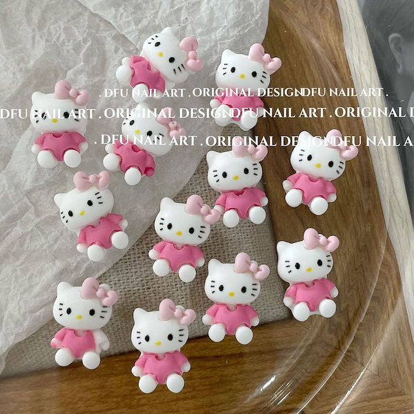 2点目以降100円引き‼️キティ★ネイルパーツ★8パーツ★リボン薄ピンク 新品・未使用】キティちゃん リボン ネイルパーツ 8個 《24時間