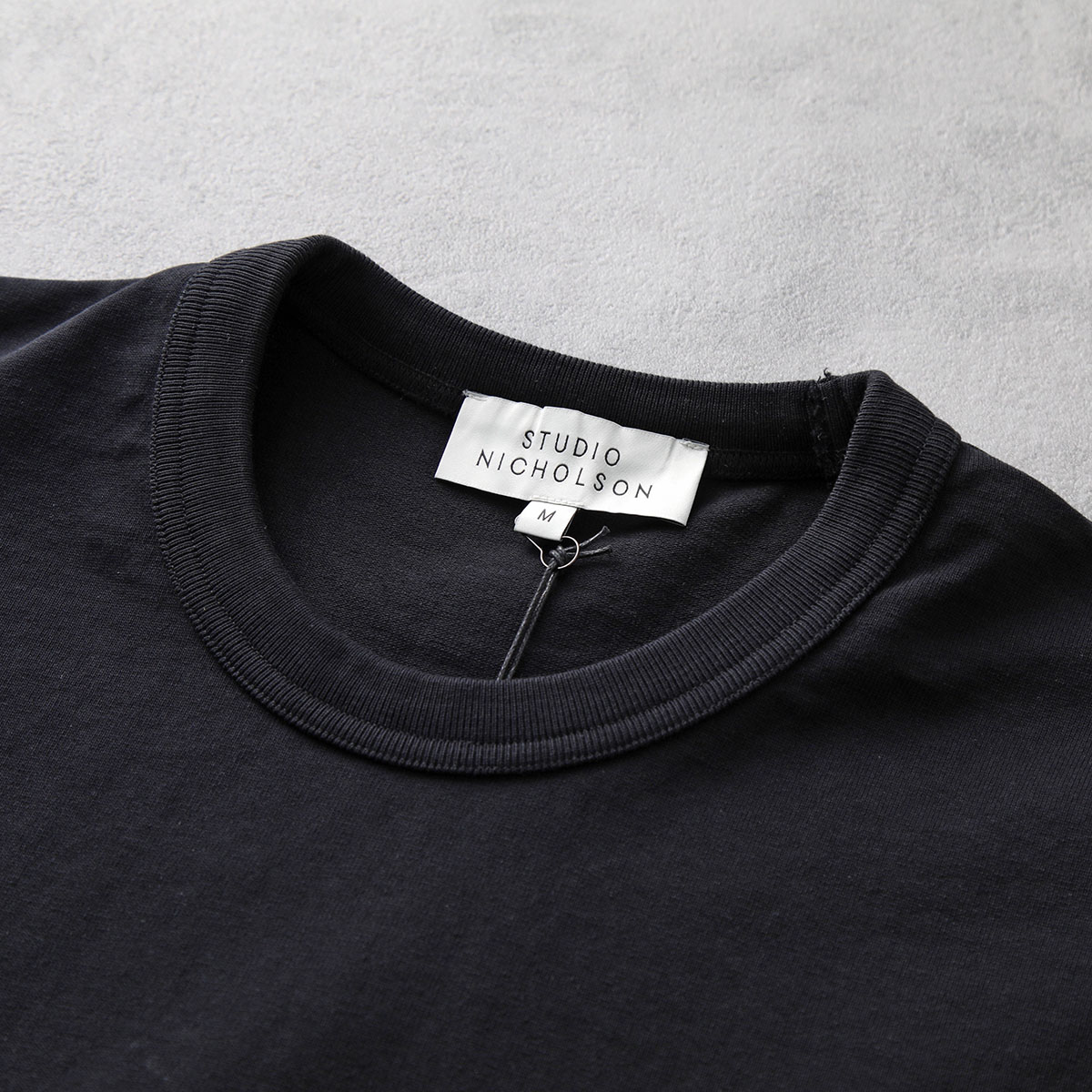 STUDIO NICHOLSON スタジオニコルソン Tシャツ MODULE SNM-1167 メンズ 半袖 カットソー ちびロゴT オーバーサイズ カラー2色