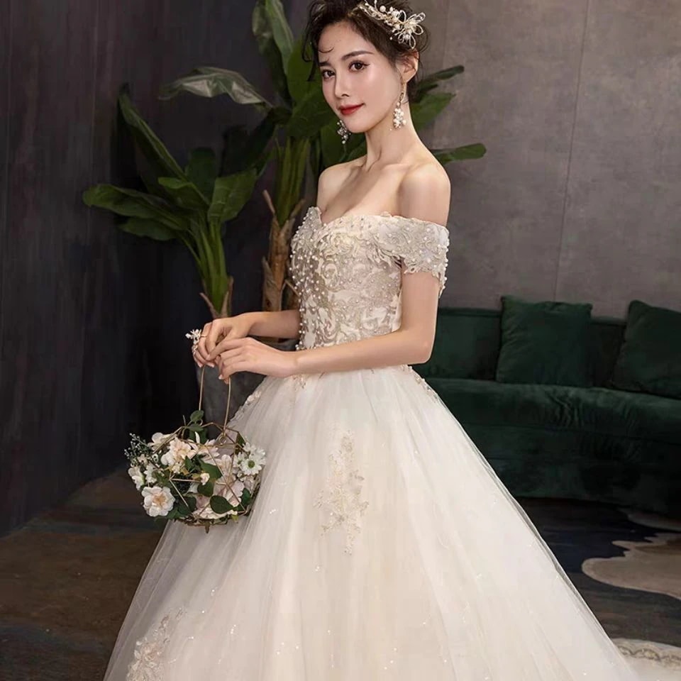 メインウェディングドレス2025トレーリング気質フロアレングショルダー太い腕をカバー小さな花嫁星空薄くて軽く見えます メインウェディングドレス2025トレーリング気質フロアレングショルダー太い腕をカバー小さな花嫁星空薄くて軽く見えます