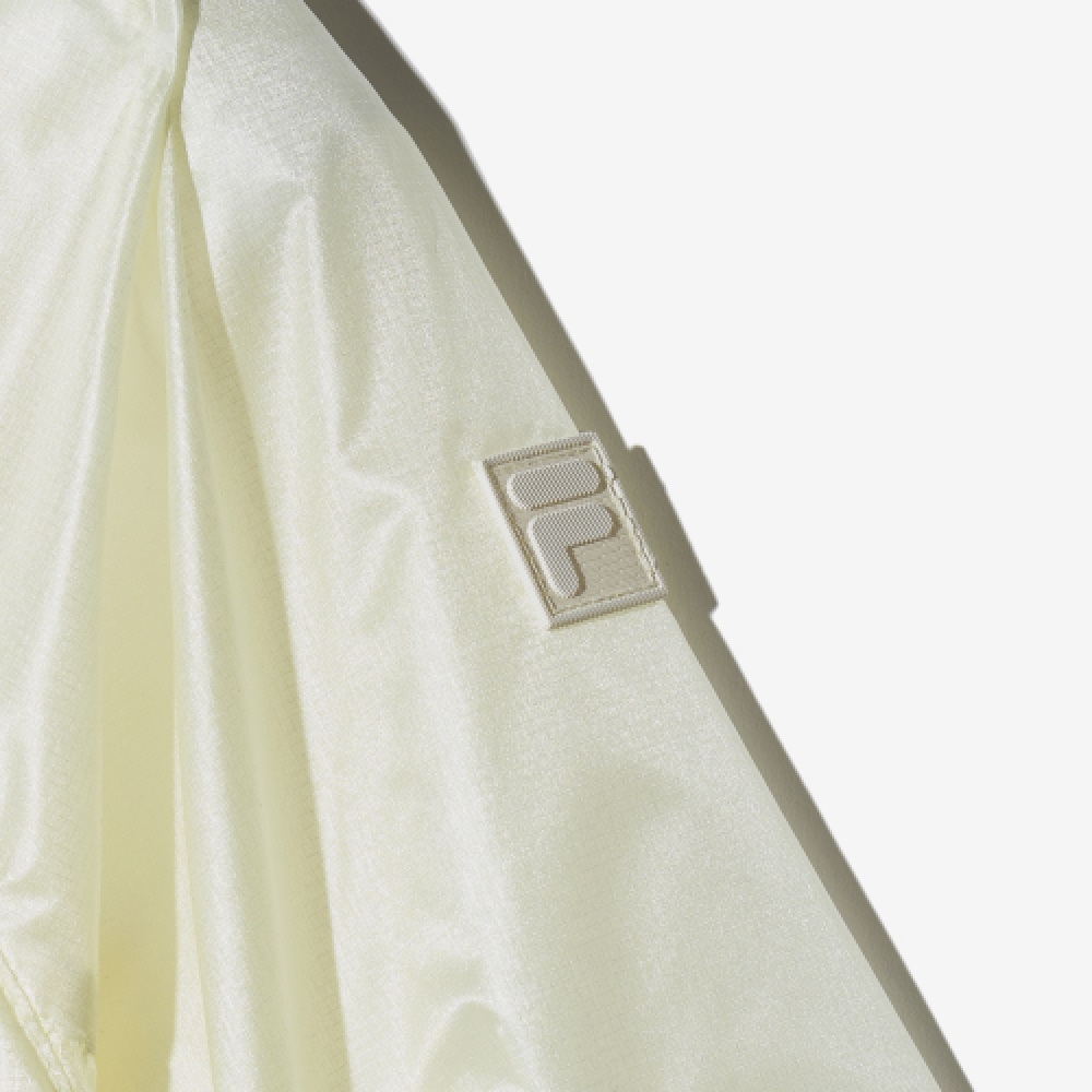 FILA 女性用パーテックスフード付きウィンドブレーカー (FS2JKH2155FCRM) FILA 女性用パーテックスフード付きウィンドブレーカー (FS2JKH2155FCRM)