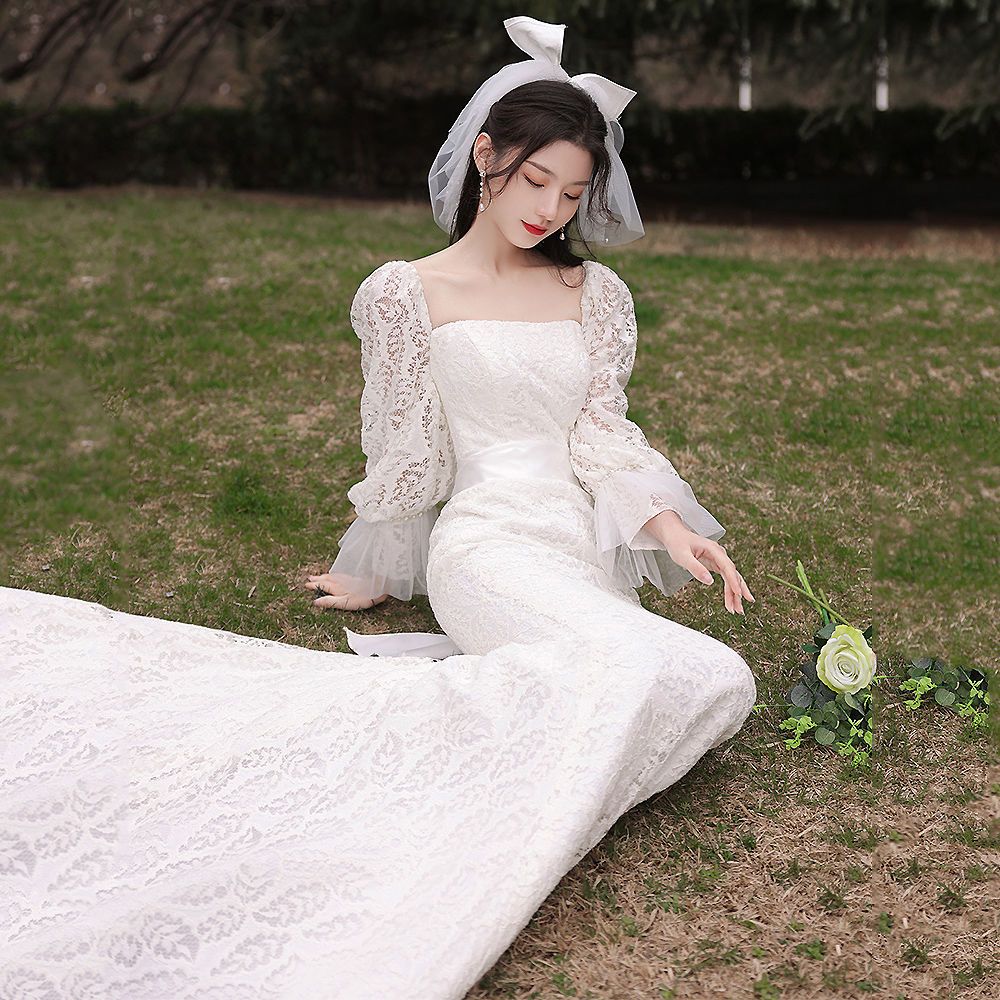 軽やかなウェディングドレス 新作の花嫁の結婚タキシードの旅は気質の魚の尾の修身の高級感の小さい尾のドレスをたたきます 軽やかなウェディングドレス 新作の花嫁の結婚タキシードの旅は気質の魚の尾の修身の高級感の小さい尾のドレスをたたきます