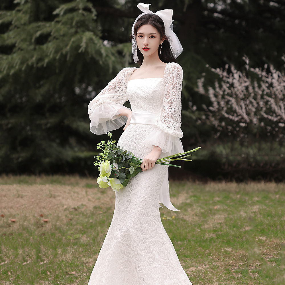 軽やかなウェディングドレス 新作の花嫁の結婚タキシードの旅は気質の魚の尾の修身の高級感の小さい尾のドレスをたたきます 軽やかなウェディングドレス 新作の花嫁の結婚タキシードの旅は気質の魚の尾の修身の高級感の小さい尾のドレスをたたきます