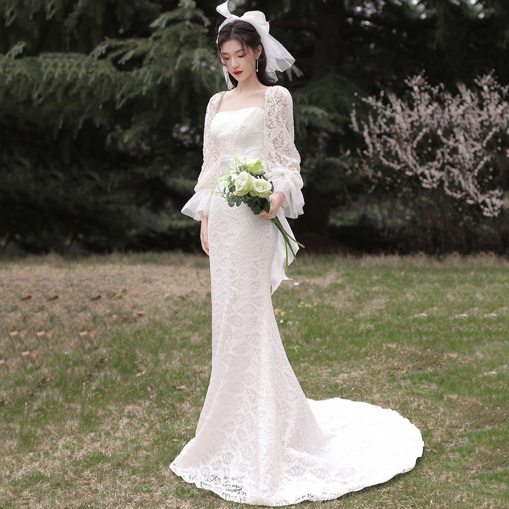 軽やかなウェディングドレス 新作の花嫁の結婚タキシードの旅は気質の魚の尾の修身の高級感の小さい尾のドレスをたたきます 軽やかなウェディングドレス 新作の花嫁の結婚タキシードの旅は気質の魚の尾の修身の高級感の小さい尾のドレスをたたきます