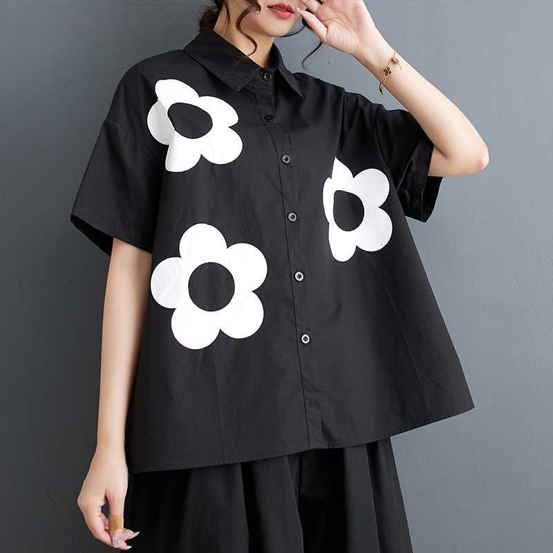 人気夏新作韓国版ゆるい大きいサイズのプリント半袖シャツの女性 人気夏新作韓国版ゆるい大きいサイズのプリント半袖シャツの女性