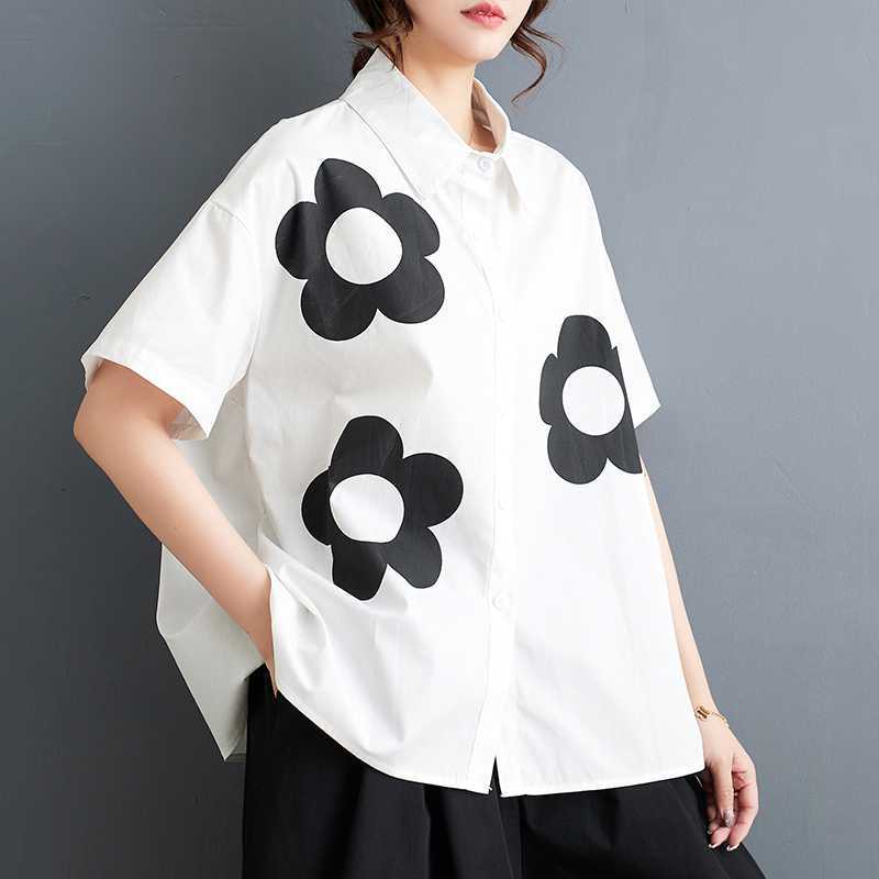 人気夏新作韓国版ゆるい大きいサイズのプリント半袖シャツの女性 人気夏新作韓国版ゆるい大きいサイズのプリント半袖シャツの女性