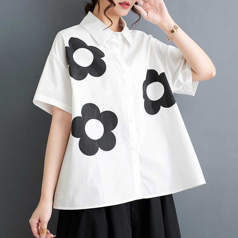 人気夏新作韓国版ゆるい大きいサイズのプリント半袖シャツの女性 人気夏新作韓国版ゆるい大きいサイズのプリント半袖シャツの女性