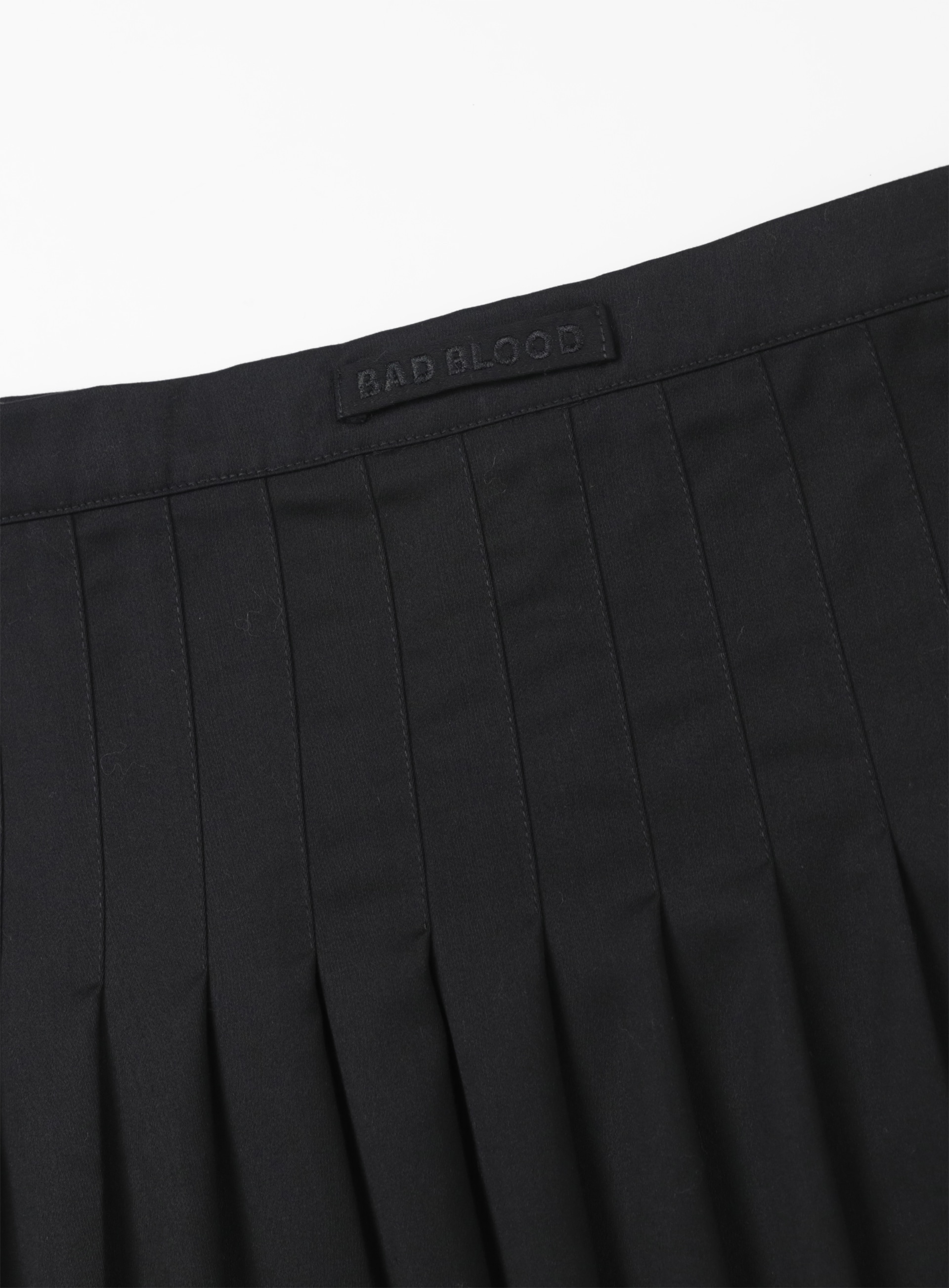 【BADBLOOD】 PLEATED TWILL WRAP SKIRT : BLACK