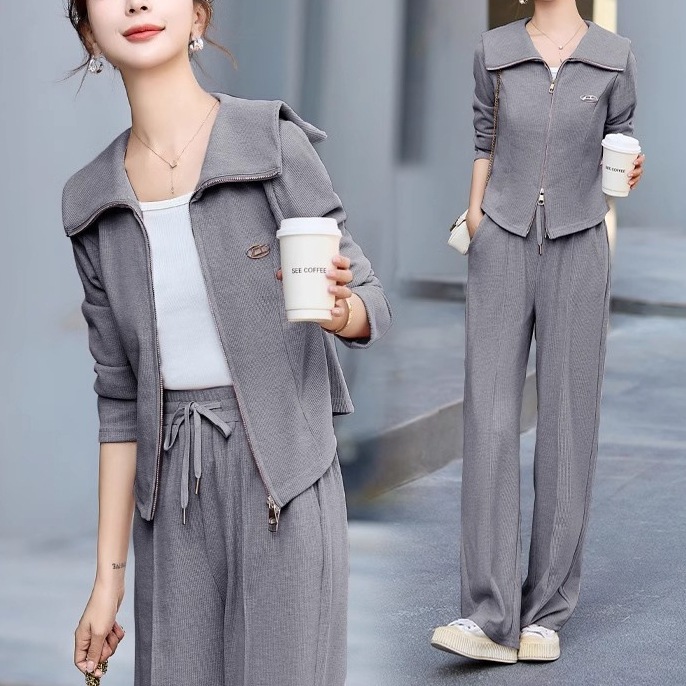 ハイエンドのカスタマイズ-女性のためのカジュアルスポーツウェアスーツ 2025 春の新スタイルルーズでスリムなラペルカーディガンワイドレッグパンツ気質 2 点セット ハイエンドのカスタマイズ-女性のためのカジュアルスポーツウェアスーツ 2025 春の新スタイルルーズでスリムなラペルカーディガンワイドレッグパンツ気質 2 点セット