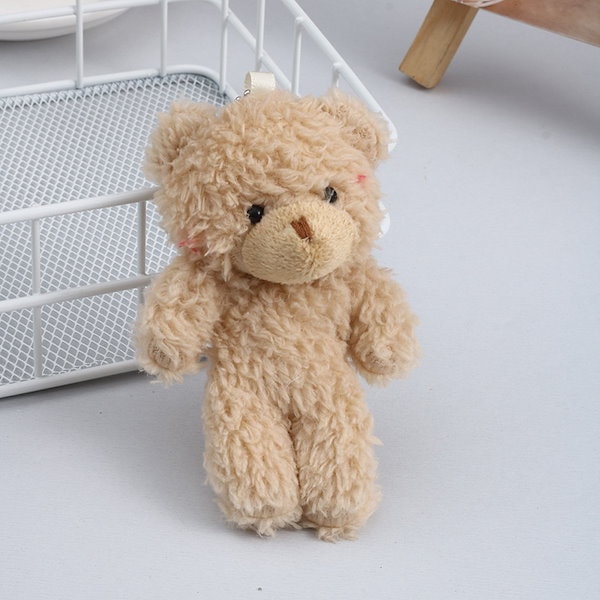 新着 Qoo10] パールフリース クマぬいぐるみ キーホル ぬいぐるみ