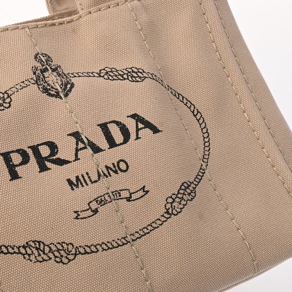 Qoo10] PRADA カナパ ミニ 2WAY ベージュ 1BG