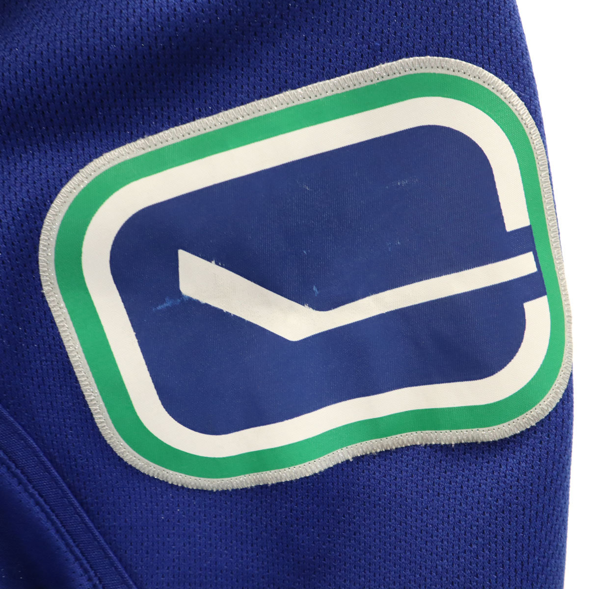 NHL バンクーバー・カナックス 長袖 ゲーム シャツ XL 青紺 ホッケー Vancouver Canucks メンズ 古着 NHL バンクーバー・カナックス 長袖 ゲーム シャツ XL 青紺 ホッケー Vancouver Canucks メンズ 古着