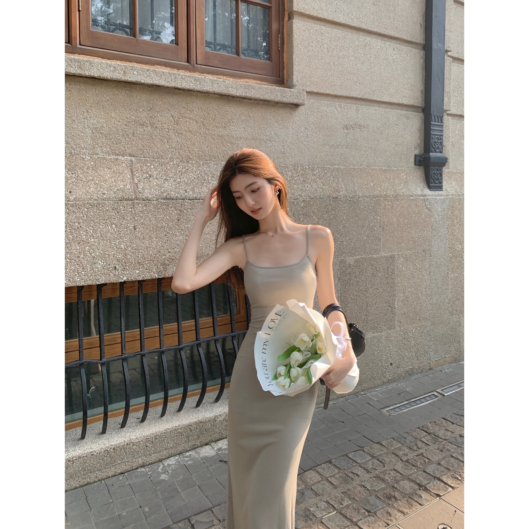 ムルバンの黒いニットのワンピースの女性の夏のセクシーなサスペンダーのスカートの気質の修身のギャルのヒップのスカート ムルバンの黒いニットのワンピースの女性の夏のセクシーなサスペンダーのスカートの気質の修身のギャルのヒップのスカート