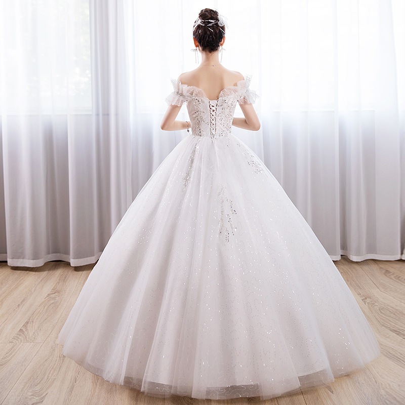 1字肩の主なウエディングドレスの新型の花嫁はシンプルにそろってフランス式の軽いウエディングドレスの高い腰の外出紗をそろえます