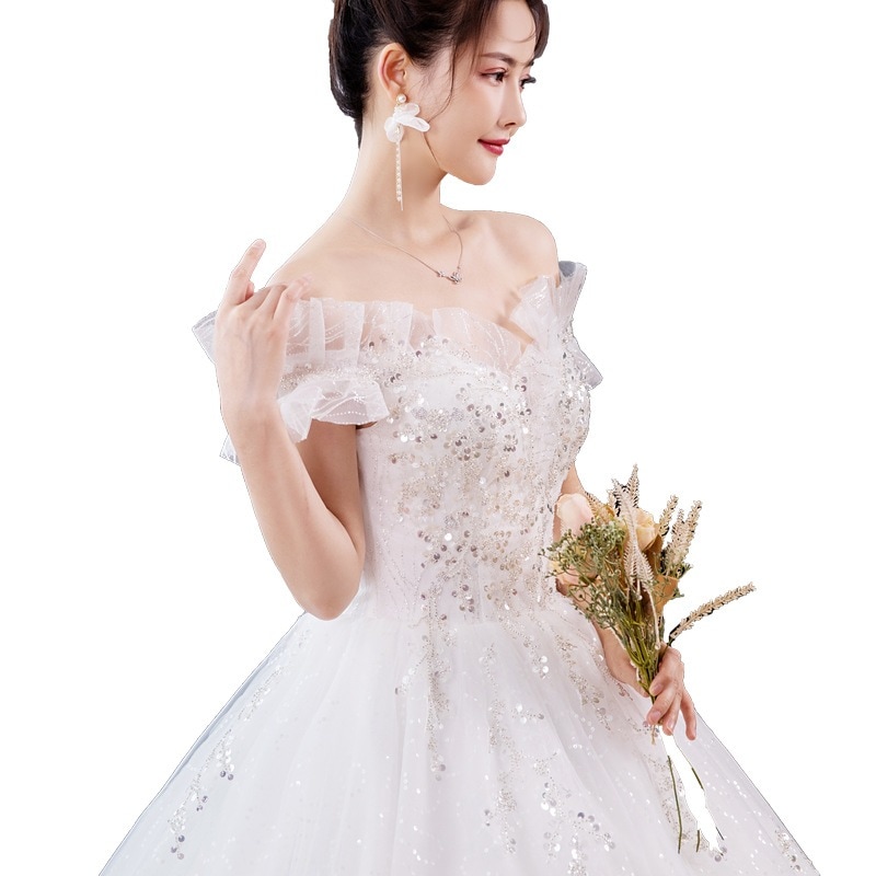 1字肩の主なウエディングドレスの新型の花嫁はシンプルにそろってフランス式の軽いウエディングドレスの高い腰の外出紗をそろえます