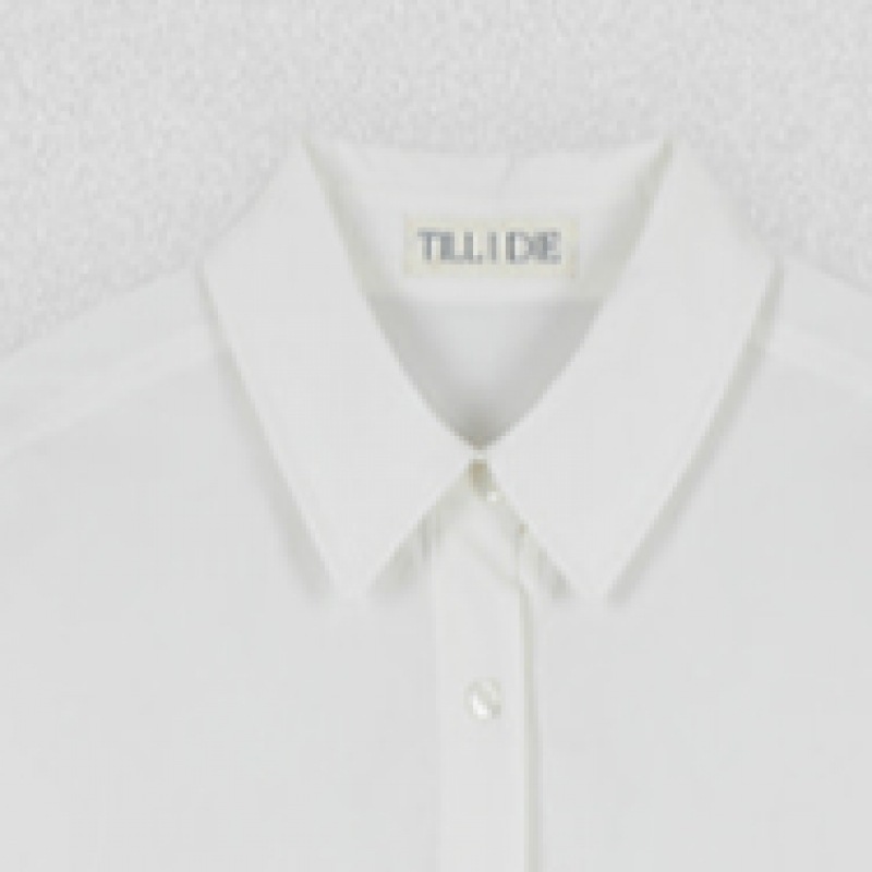 TILLIDIE サイドボタンスリットラップシャツアイボリー TILLIDIE サイドボタンスリットラップシャツアイボリー