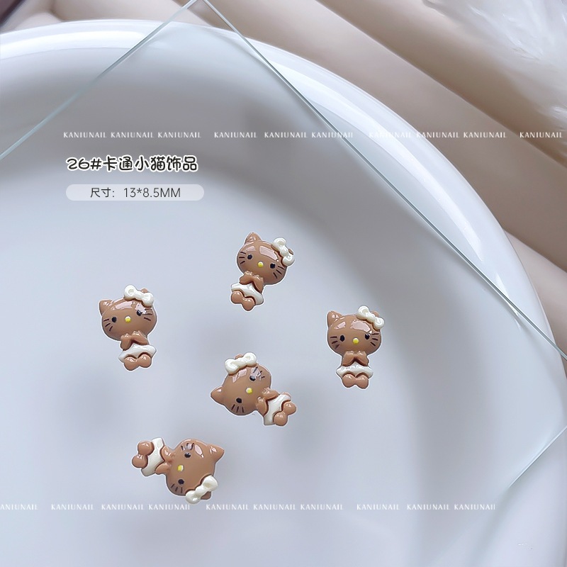 【1点ご購入 で10点プレゼントいたします】ネイルがかわいい黒革のミミアクセサリー2024キャラクターリボンネイル飾り樹脂のドリル