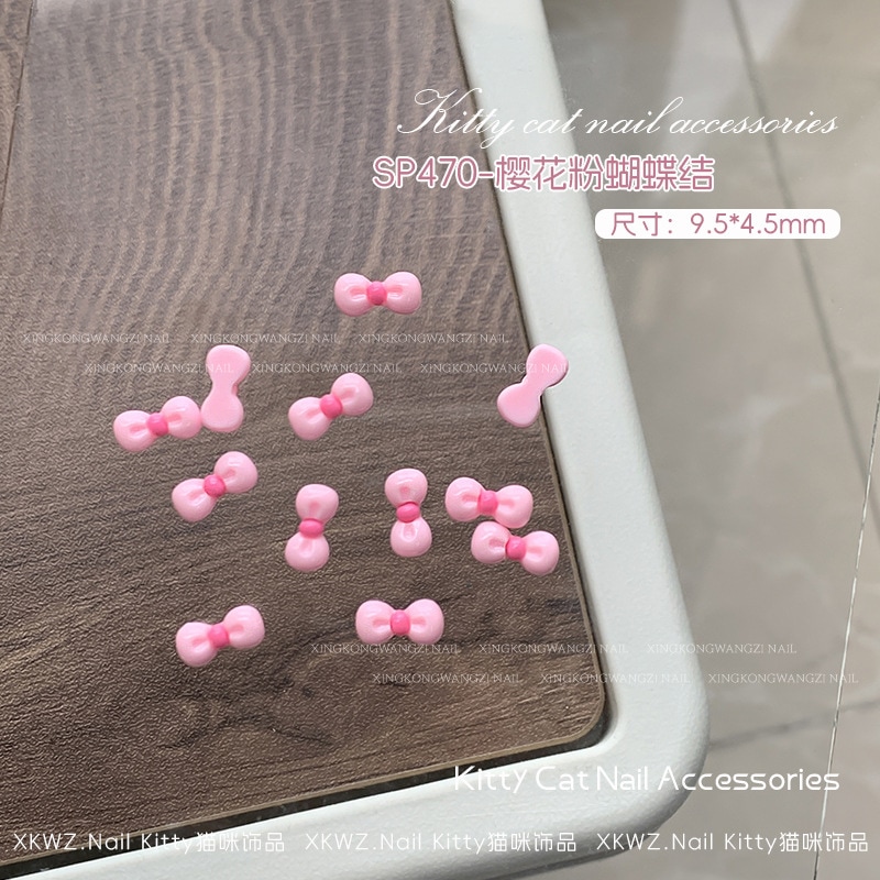 【1点ご購入 で10点プレゼントいたします】ネイルがかわいい黒革のミミアクセサリー2024キャラクターリボンネイル飾り樹脂のドリル