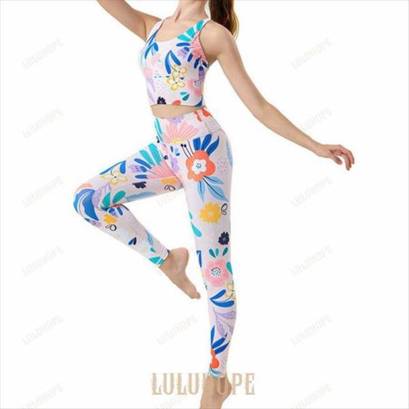 【新品/数量限定/セール】ヨガウェア 上下セット セットアップ 2点セット レディース スポーツ ブラ ド レギンス ボタニカル柄 バッククロス 黒