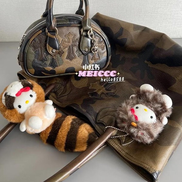 Qoo10] アライグマのハローキティの黒いバッグのス