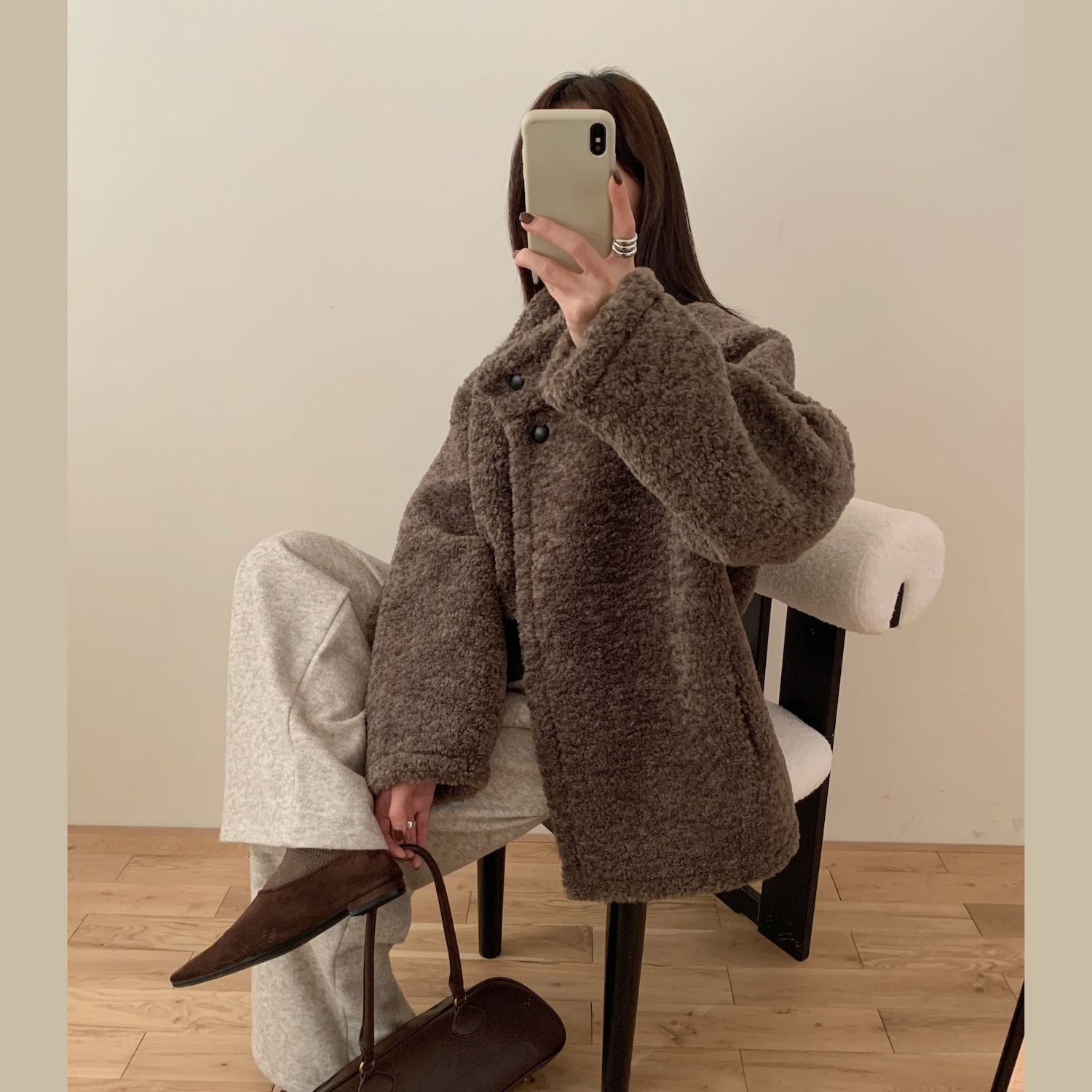 冬の新型韓国版洋気毛皮一体羊巻き毛立襟ゆるい単列ボタン綿服コート