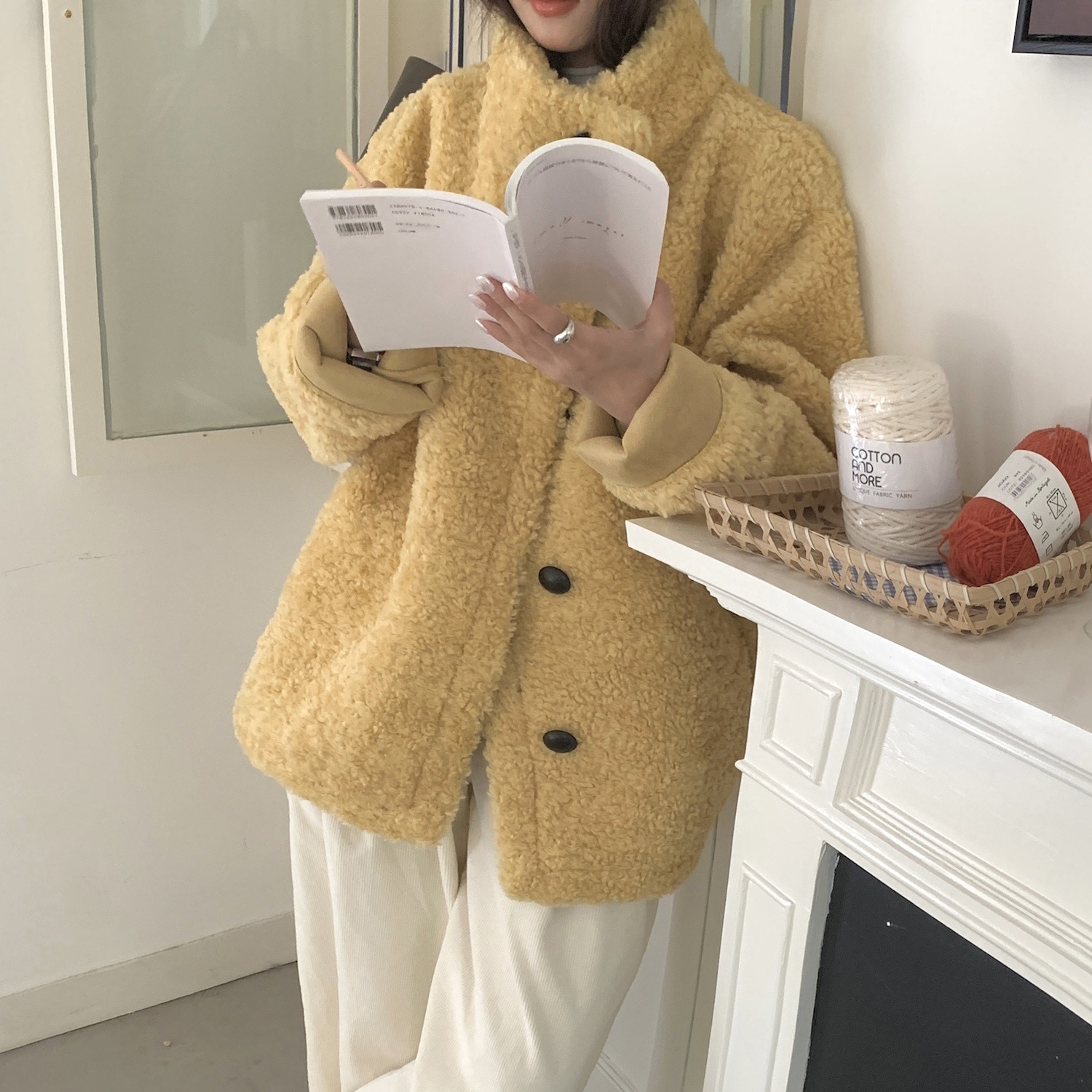 冬の新型韓国版洋気毛皮一体羊巻き毛立襟ゆるい単列ボタン綿服コート