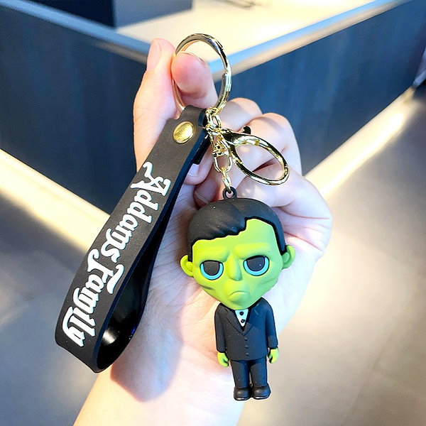 Qoo10] 水曜日のキーホルダーアダムスファミリー人