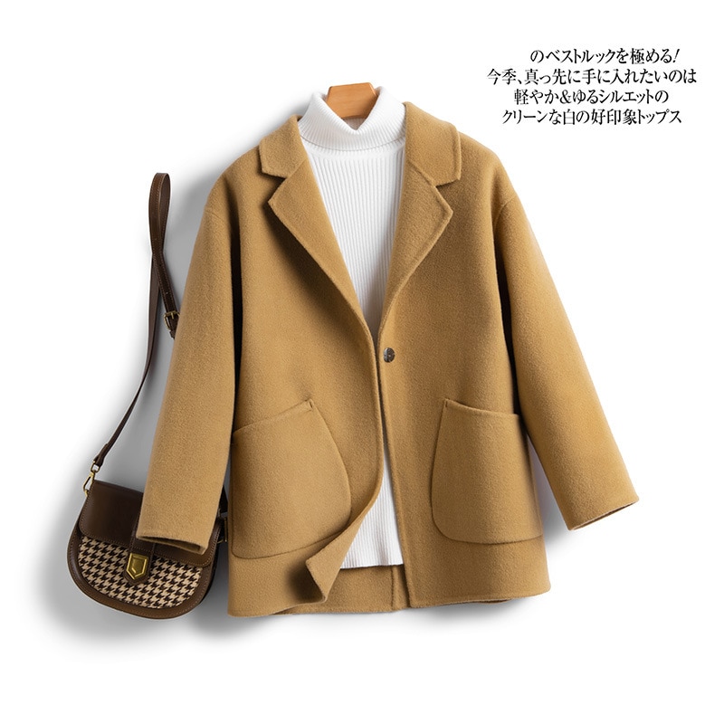 一粒のウールのラシャのコートは秋冬の保温が純粋で街頭のゆったりとしたファッションがあります