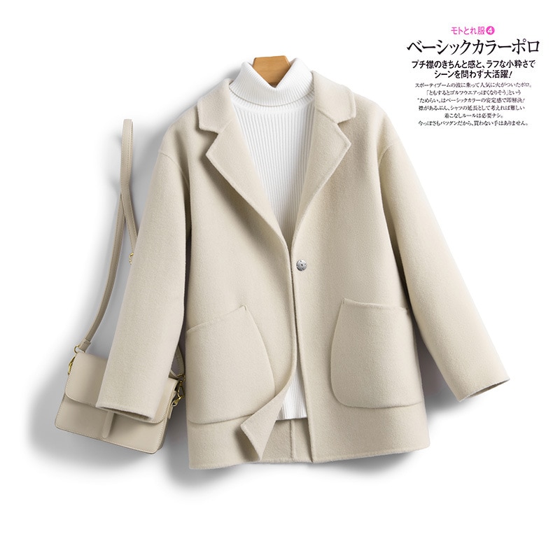 一粒のウールのラシャのコートは秋冬の保温が純粋で街頭のゆったりとしたファッションがあります