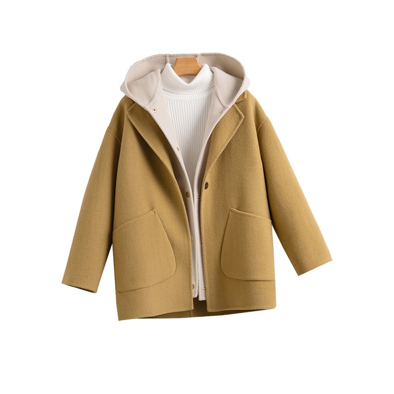 一粒のウールのラシャのコートは秋冬の保温が純粋で街頭のゆったりとしたファッションがあります