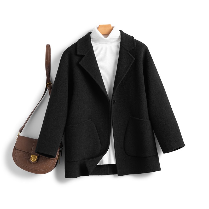 一粒のウールのラシャのコートは秋冬の保温が純粋で街頭のゆったりとしたファッションがあります