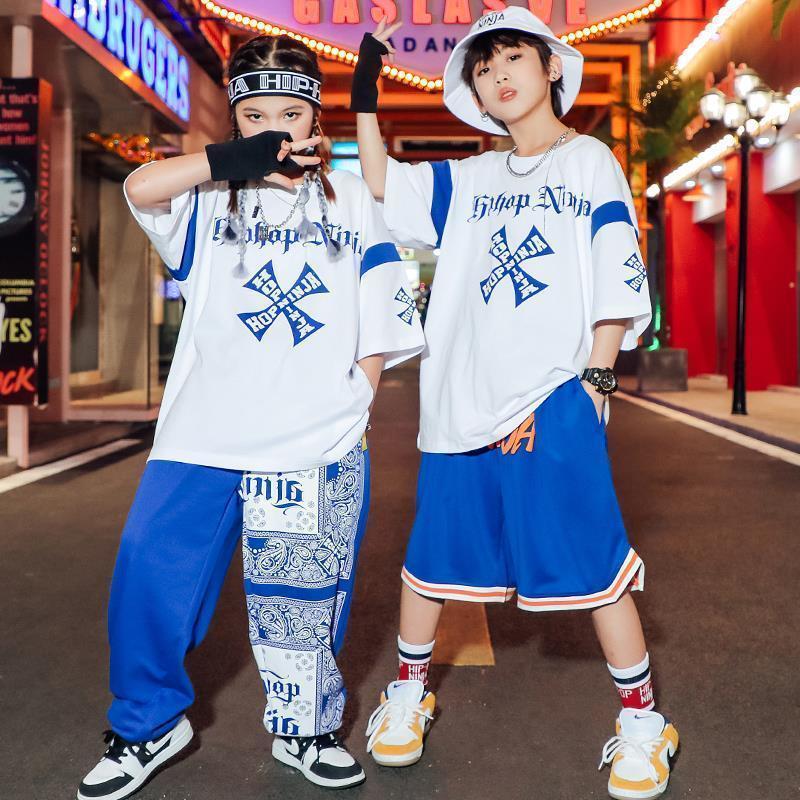 子供の街のダンスの男女の子供のヒップホップのゆったりした金のスーツの半袖のズボンのtシャツの子供の夏の時計は潮の服を演出します