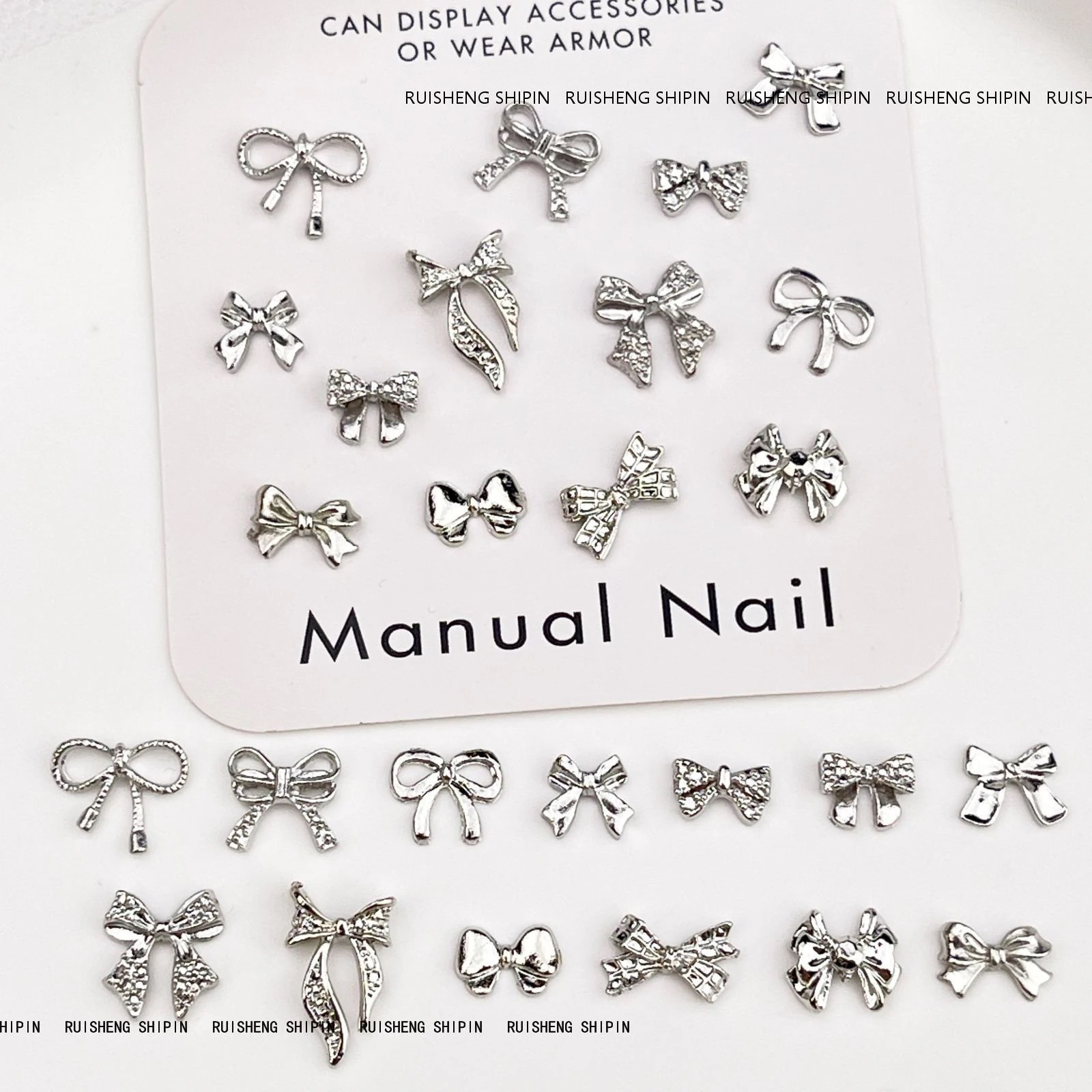 【10個セット】粒入合金の蝶結びのネイルアクセサリーのレトロで軽い豪華な白k色のリボンの銀色の蝶ネクタイの爪のアクセサリー 【10個セット】粒入合金の蝶結びのネイルアクセサリーのレトロで軽い豪華な白k色のリボンの銀色の蝶ネクタイの爪のアクセサリー
