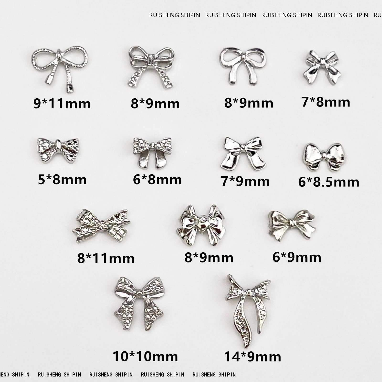 【10個セット】粒入合金の蝶結びのネイルアクセサリーのレトロで軽い豪華な白k色のリボンの銀色の蝶ネクタイの爪のアクセサリー 【10個セット】粒入合金の蝶結びのネイルアクセサリーのレトロで軽い豪華な白k色のリボンの銀色の蝶ネクタイの爪のアクセサリー