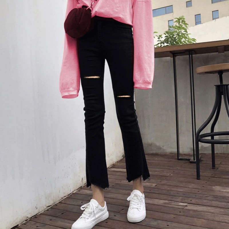 ダメージジーンズ スキニーパンツ ジーンズの女子学生は背が高くて腰がゆったりして痩せているフレアーパンツ ダメージジーンズ スキニーパンツ ジーンズの女子学生は背が高くて腰がゆったりして痩せているフレアーパンツ