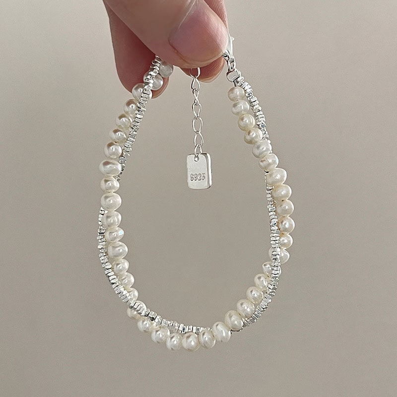 925スターリングシルバーの重工業の真珠は銀のビーズのブレスレットの女性の軽い贅沢なニッチの繊細なビーズを押しつぶした 925スターリングシルバーの重工業の真珠は銀のビーズのブレスレットの女性の軽い贅沢なニッチの繊細なビーズを押しつぶした