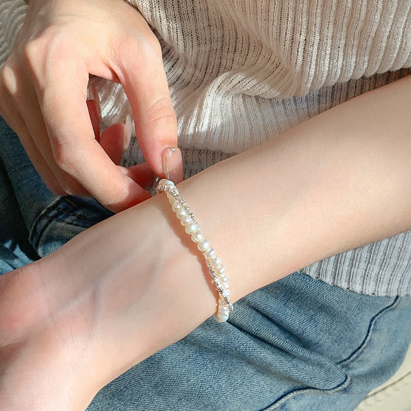 925スターリングシルバーの重工業の真珠は銀のビーズのブレスレットの女性の軽い贅沢なニッチの繊細なビーズを押しつぶした 925スターリングシルバーの重工業の真珠は銀のビーズのブレスレットの女性の軽い贅沢なニッチの繊細なビーズを押しつぶした
