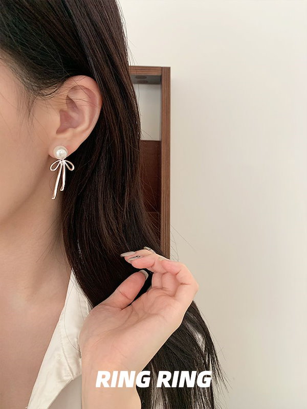 Qoo10] パールリボンピアス女性新作人気韓国繊細ピ