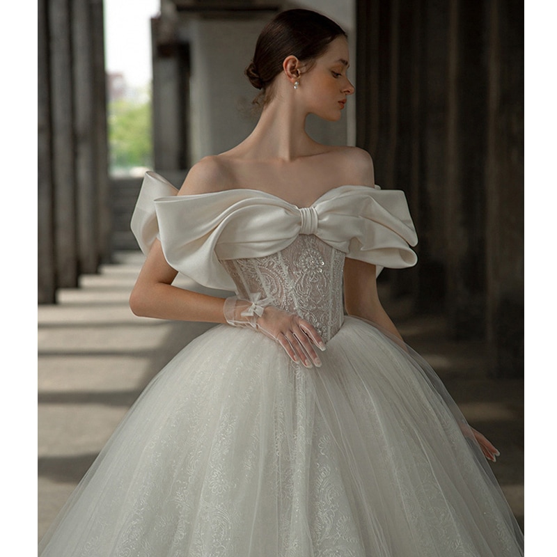 イタリアサテンのドレス演奏会 二次会 結婚式 パーティードレス 花嫁 ウェディングドレス カラードレお呼ばれドレスパーティードレス プリンセス花嫁 リボン本 斉地のウエディングドレス