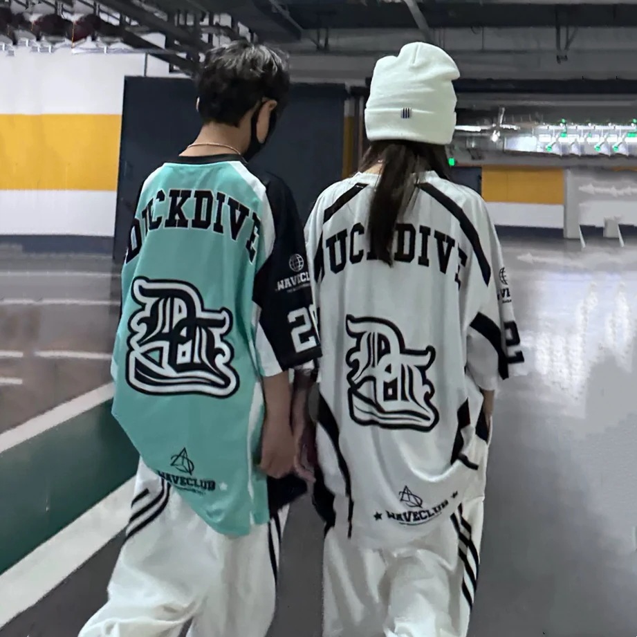 韓国の男女の子供のヒップホップの速乾の半袖のtシャツのズボンの子供の六一の街のダンスはhiphopを演じて服のスーツを出します